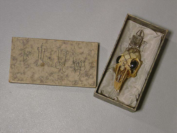 "Rabbit Skull", Simon Costin (British, born 1963), a) bone, silver, rock crystal and hematite; b) paper, silk; c) paper, British