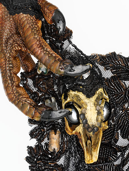 "Memento Mori", Simon Costin (British, born 1963), a) wood, metal, bone, claw, synthetic, jet, crystal, bone, hematite; b) paper, cotton, silk; c) paper, British