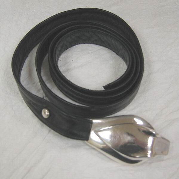 Ensemble, Halston (American, Des Moines, Iowa 1932–1990 San Francisco, California), a-d) wool; e) leather, silver
e) leather, metal, American