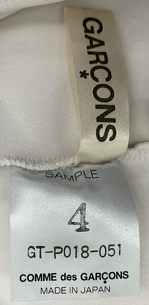 Ensemble, (a–d) Comme des Garçons (Japanese, founded 1969), (a, b) synthetic, (c, d) leather, (e) silk, synthetic, Japanese