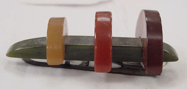 Clip, plastic (Bakelite), metal, American