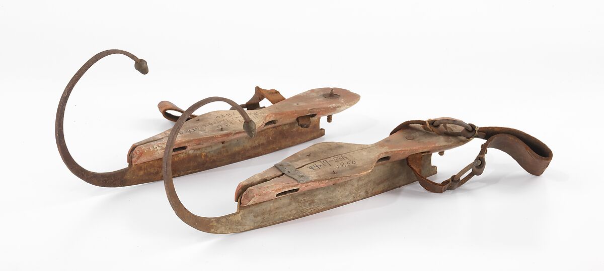 Ice skates, leather, wood, metal, American 