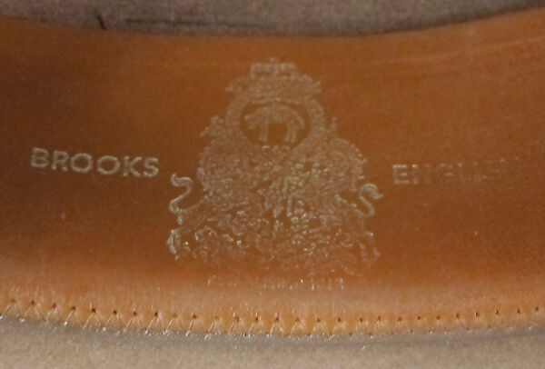 Suit, (a) wool; (b) wool; (c) silk; (d) silk, leather, metal; (e) cotton; (f) metal; (g, h) metal, enamel; (i) silk; (j, k) cotton, synthetic; (l, m) silk, leather, metal; (n, o) leather; (p) wool, silk, leather; (q) wood, rubber., American