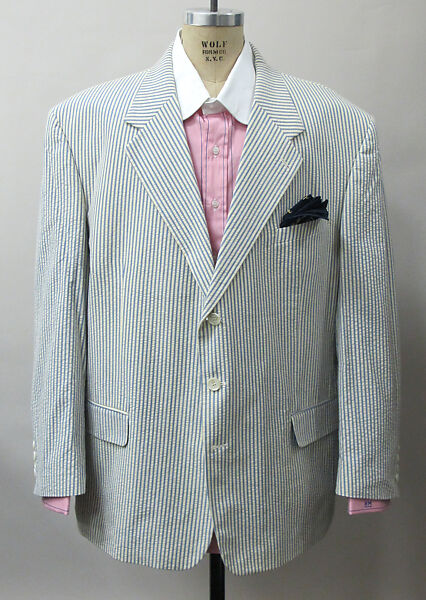 Suit, (a) cotton, synthetic; (b) cotton, synthetic, metal; (c) silk; (d) silk, leather, metal; (e) cotton; (f, g) metal, enamel; (h) silk; (i, j) cotton; (k, l) leather; (m) straw, silk, leather; (n) wood, horn, synthetic., American 