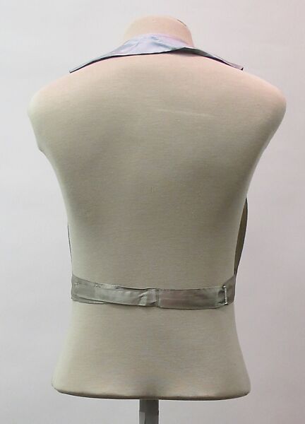 Suit, wool, silk, synthetic, metal, mother-of-pearl, British