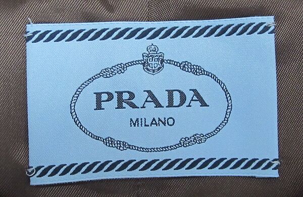 Ensemble, Prada (Italian, founded 1913), (a) wool, silk, plastic, feathers; (b, c) leather, plastic (vinyl), Italian