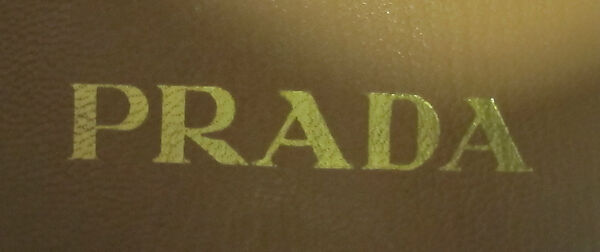 Ensemble, Prada (Italian, founded 1913), (a) wool, silk, plastic, feathers; (b, c) leather, plastic (vinyl), Italian