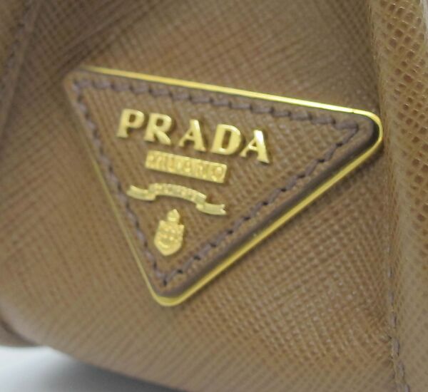 Ensemble, Prada (Italian, founded 1913), (a, b) wool, synthetic, (c, d) leather, synthetic, metal, (e) leather, metal, Italian