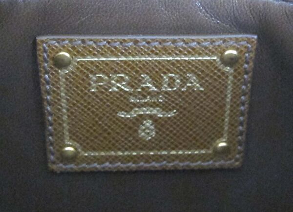 Ensemble, Prada (Italian, founded 1913), (a, b) wool, synthetic, (c, d) leather, synthetic, metal, (e) leather, metal, Italian