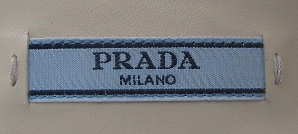 Ensemble, Prada (Italian, founded 1913), (a) cotton, metal, (b) cotton,  mother-of-pearl, metal, (c, d) cotton, metal, (e) cotton, metal, (f) cotton, mother-of-pearl, (g, h) cotton, (i, j) snakeskin, leather, Italian