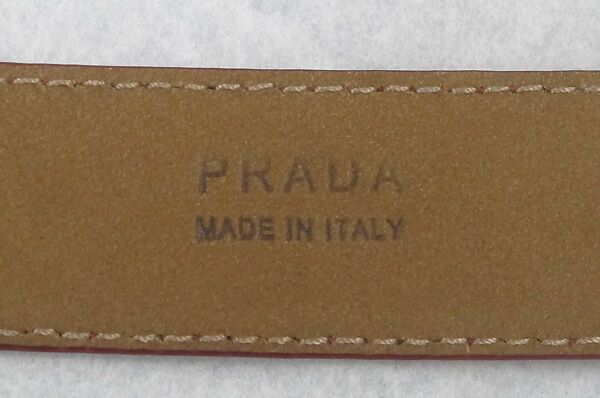 Ensemble, Prada (Italian, founded 1913), (a) wool, synthetic, (b) wool, silk, cotton, metal, (c) leather, metal, (d, e) leather, (f, g) leather, synthetic, metal, (h) leather, silk, metal, (i) leather, metal, Italian
