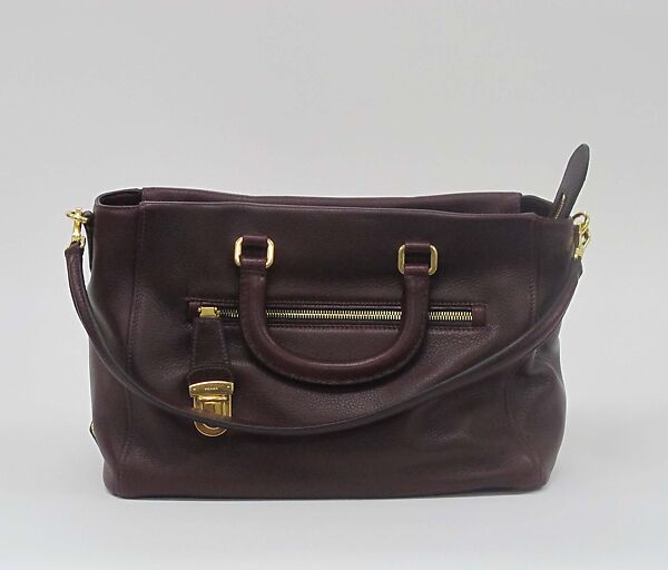 Ensemble, Prada (Italian, founded 1913), (a) wool, synthetic, (b) wool, silk, cotton, metal, (c) leather, metal, (d, e) leather, (f, g) leather, synthetic, metal, (h) leather, silk, metal, (i) leather, metal, Italian