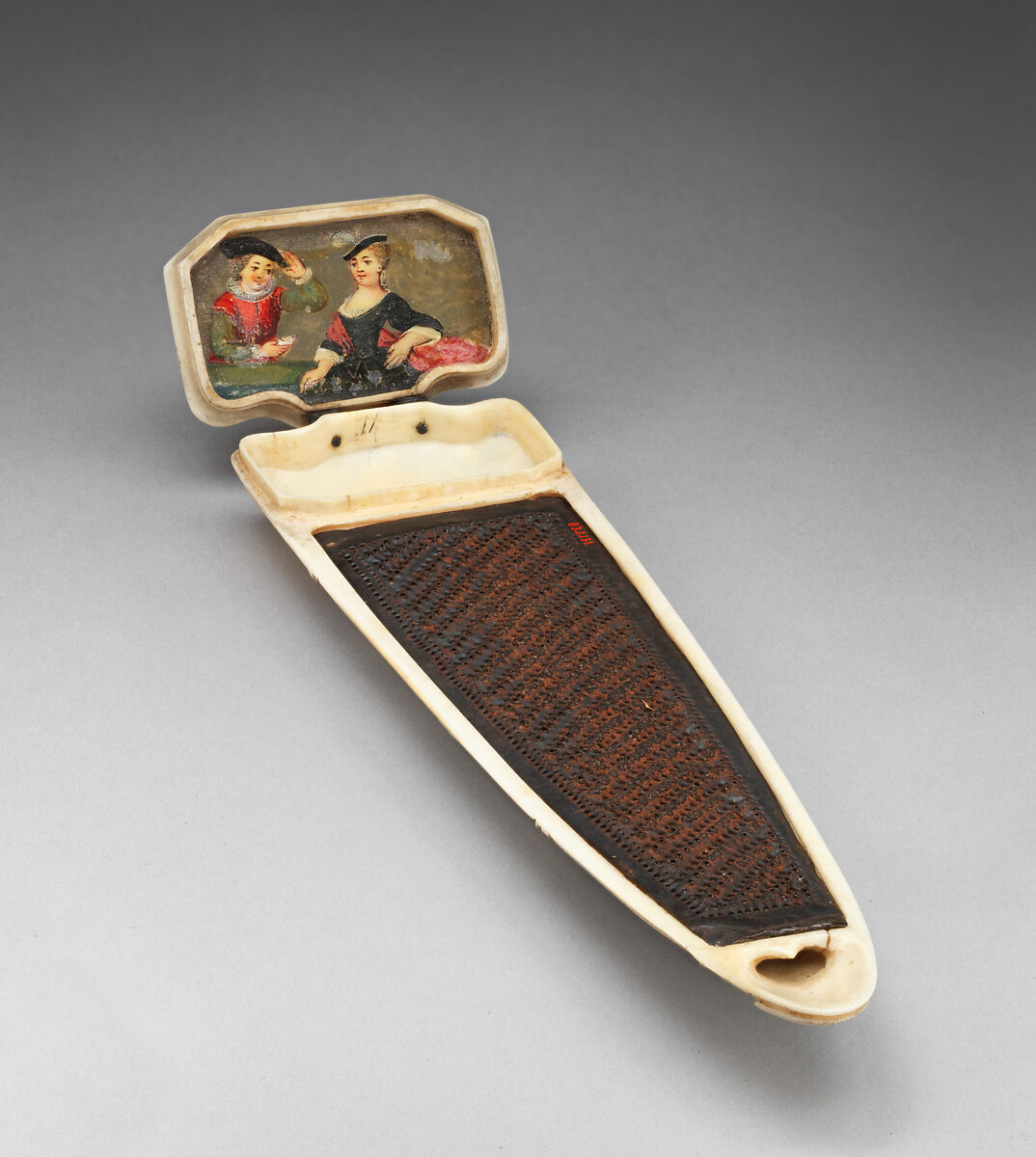 Tobacco rasp carved with Zeus astride an eagle, Ivory and iron, French