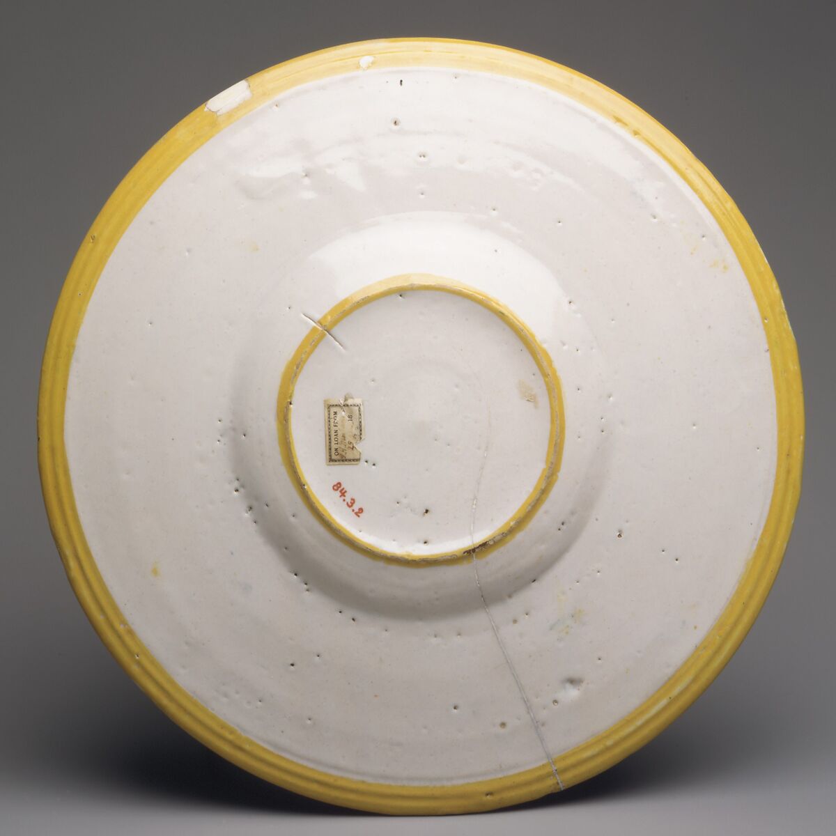 Plate with Paris Killing Achilles and arms of the Calini family, Nicolo da Gabriele Sbraghe (Italian, active by 1520–37/38), Maiolica (tin-glazed earthenware), Italian, Urbino
