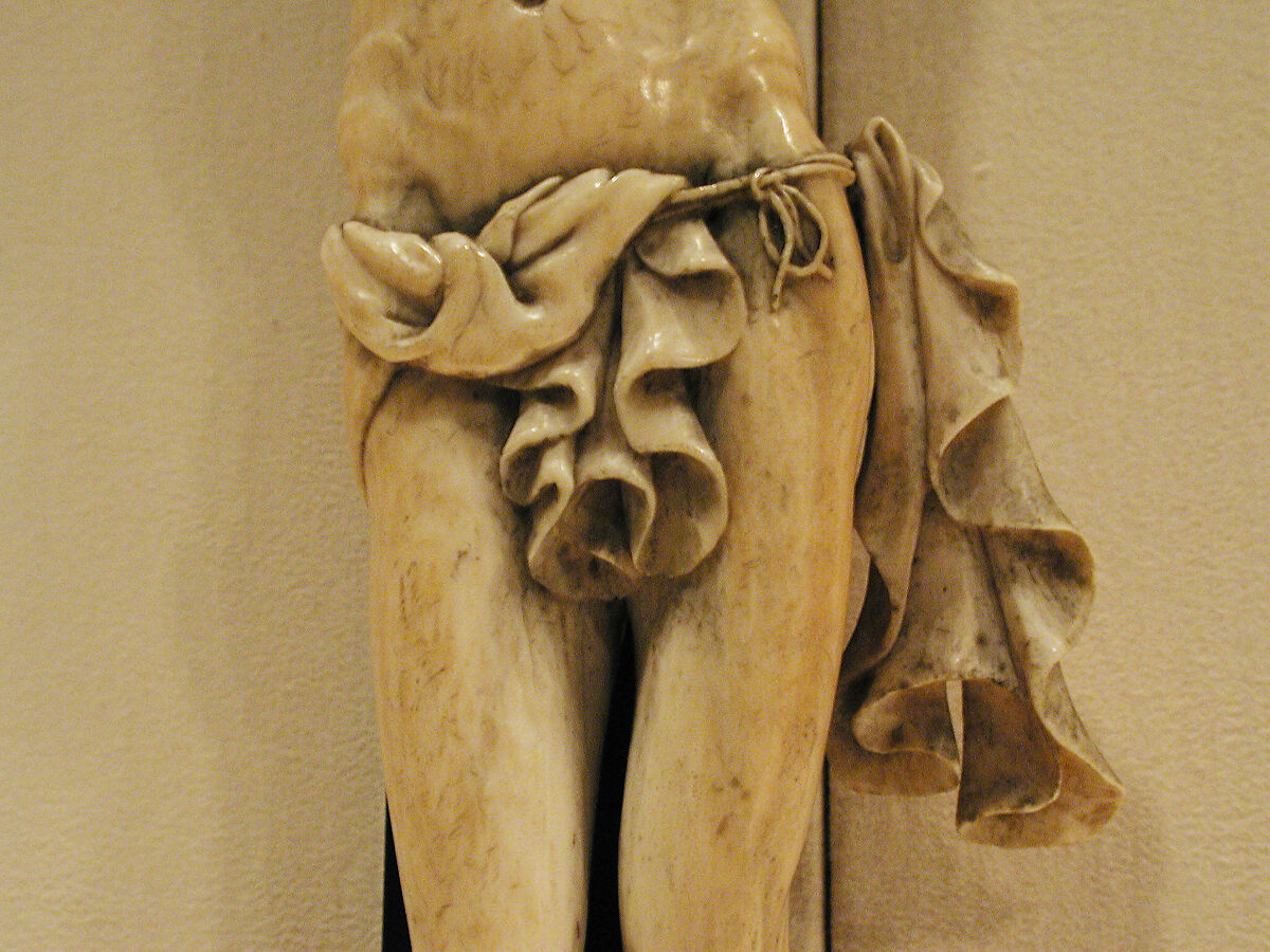 Crucifix, Figure: ivory; cross: ebony; scroll: brass (?), Spanish