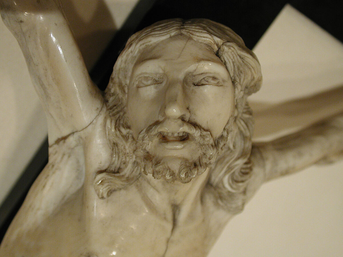 Crucifix, Figure: ivory; cross: ebony; scroll: brass (?), Spanish