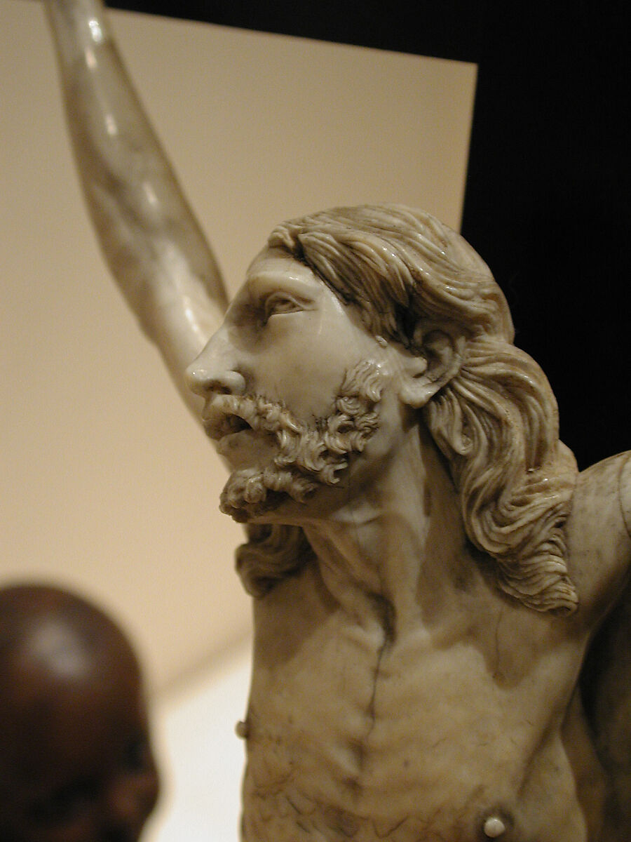 Crucifix, Figure: ivory; cross: ebony; scroll: brass (?), Spanish