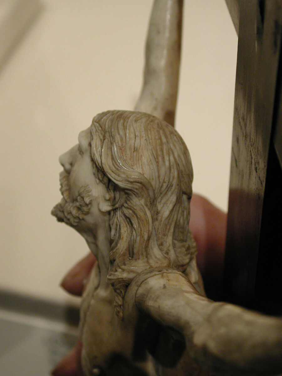 Crucifix, Figure: ivory; cross: ebony; scroll: brass (?), Spanish