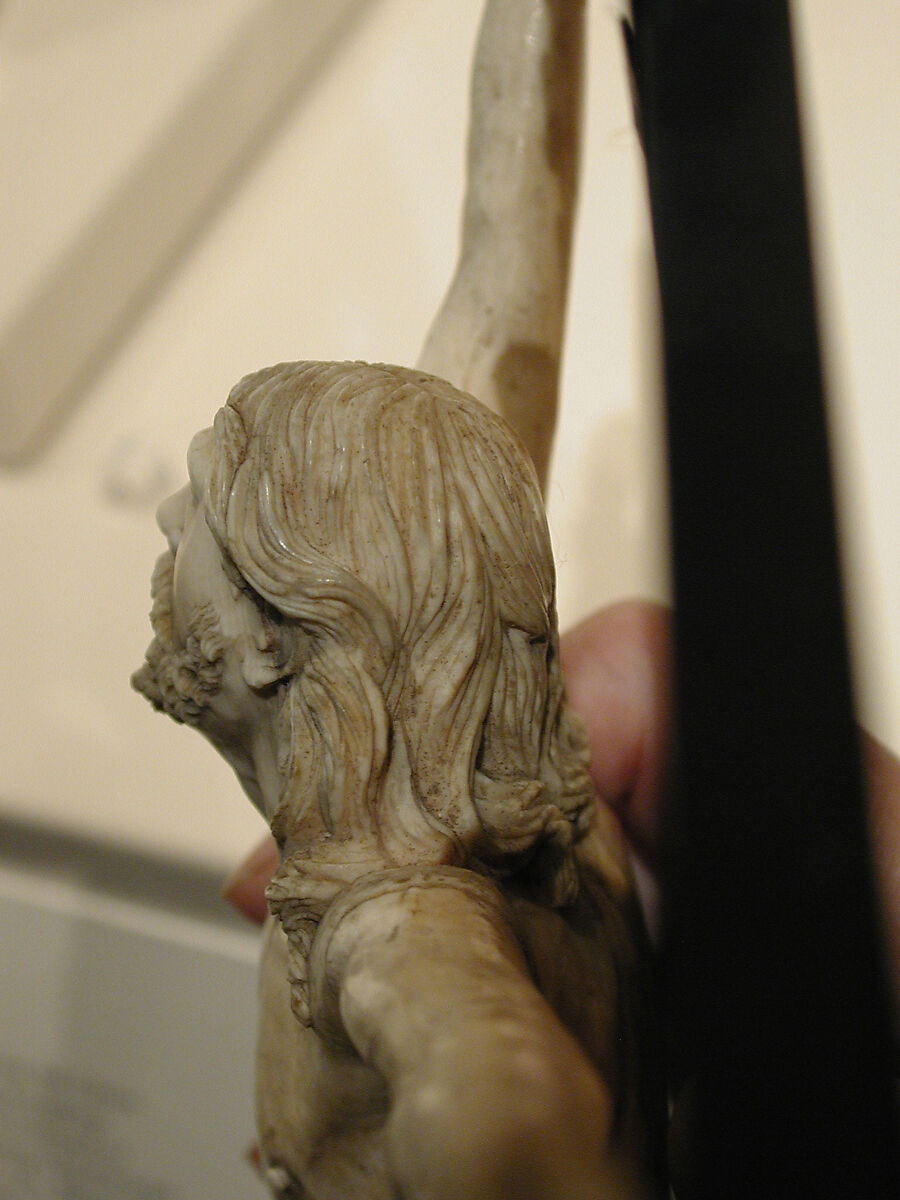 Crucifix, Figure: ivory; cross: ebony; scroll: brass (?), Spanish