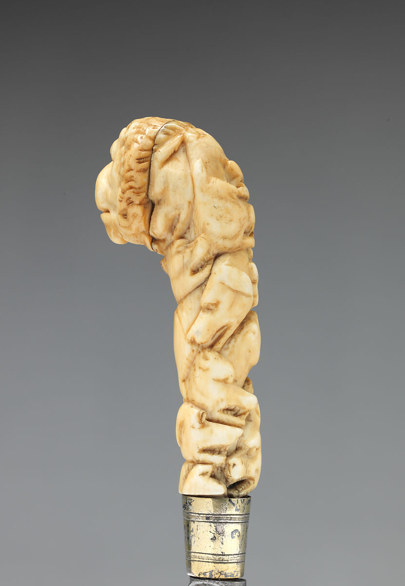 Table knife with handle carved with lion's head, Steel, ivory, brass, possibly German, Saxony