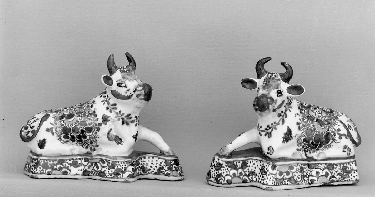 Pair of reclining cows, Tin-glazed earthenware, Dutch, Delft 