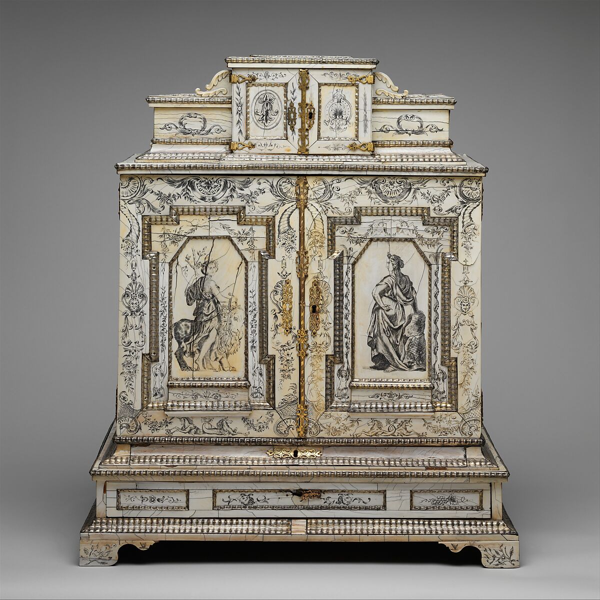 Cabinet, Cabinetry by the workshop of Melchior Baumgartner (German) (1621–1686), Oak, pine, walnut, cedar, ebony, and rosewood; ivory veneer and silver veneer; silver; silver-gilt moldings; gilded yellow-metal mounts; the drawers lined with aquamarine-colored silk, German, Augsburg
