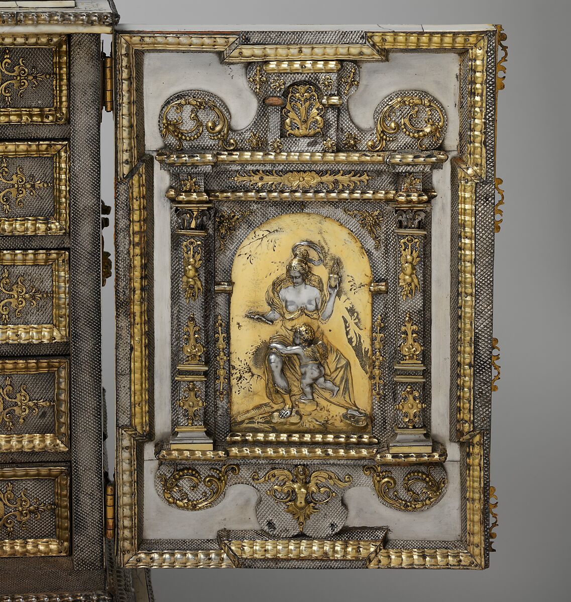 Cabinet, Cabinetry by the workshop of Melchior Baumgartner (German) (1621–1686), Oak, pine, walnut, cedar, ebony, and rosewood; ivory veneer and silver veneer; silver; silver-gilt moldings; gilded yellow-metal mounts; the drawers lined with aquamarine-colored silk, German, Augsburg