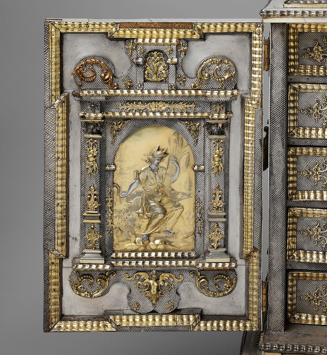 Cabinet, Cabinetry by the workshop of Melchior Baumgartner (German) (1621–1686), Oak, pine, walnut, cedar, ebony, and rosewood; ivory veneer and silver veneer; silver; silver-gilt moldings; gilded yellow-metal mounts; the drawers lined with aquamarine-colored silk, German, Augsburg