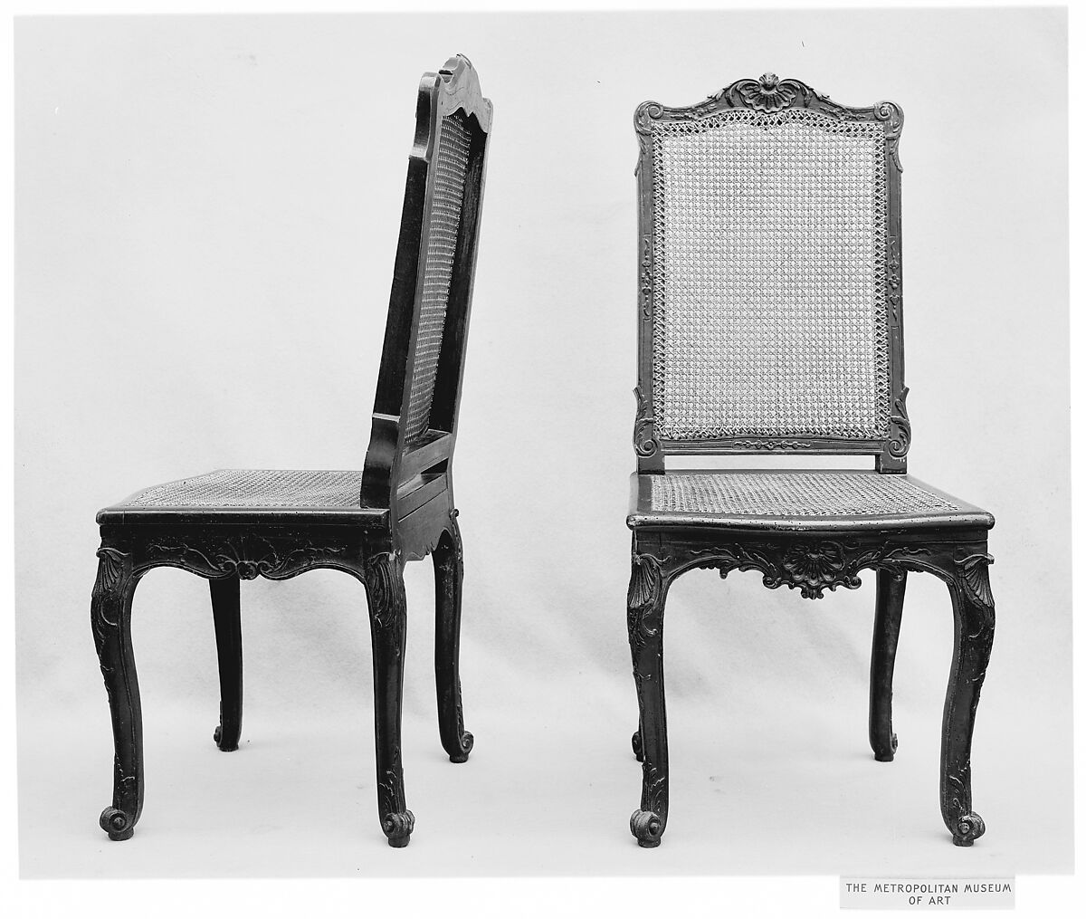 Pair of side chairs, Beech wood, painted black; caning, French 