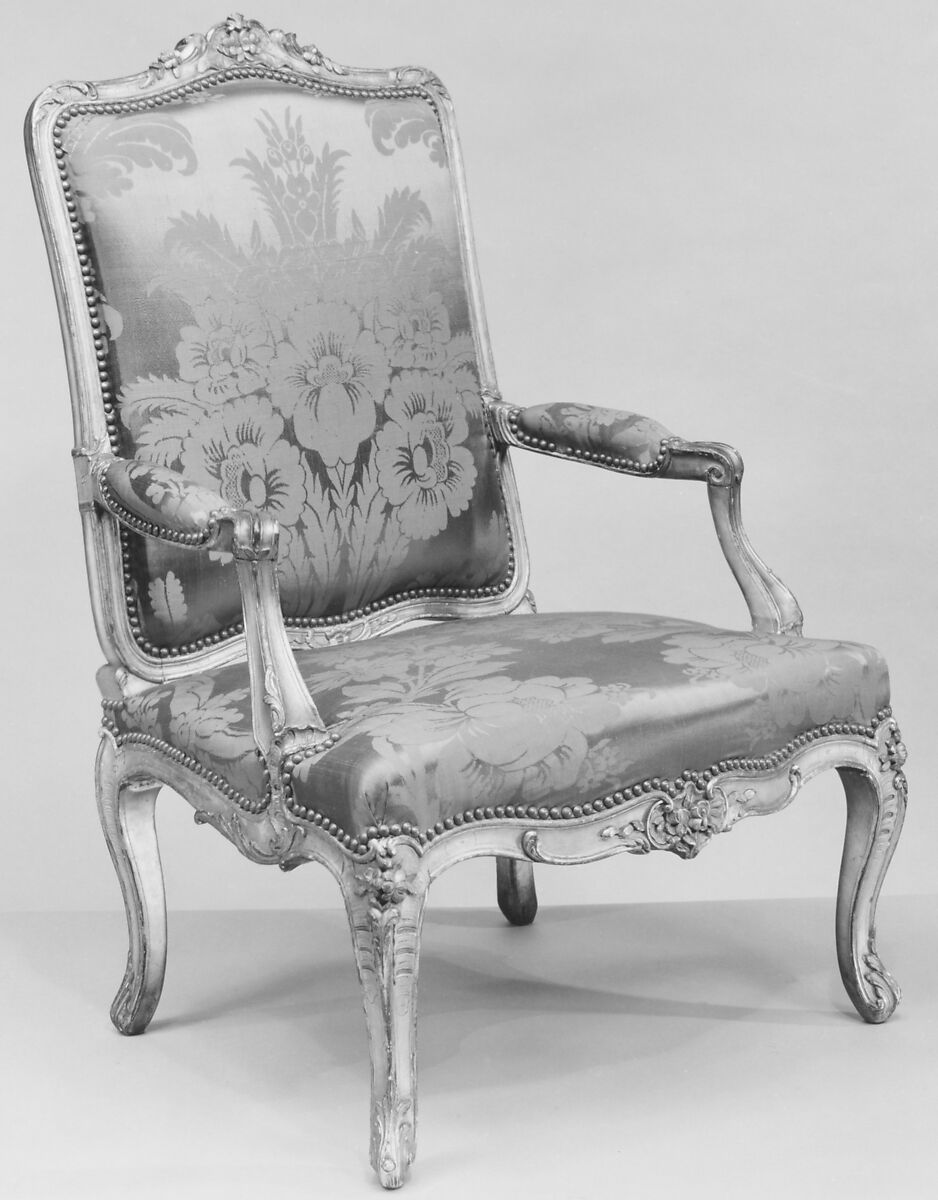 Pair of armchairs, Carved and gilded walnut; red damask upholstery, French