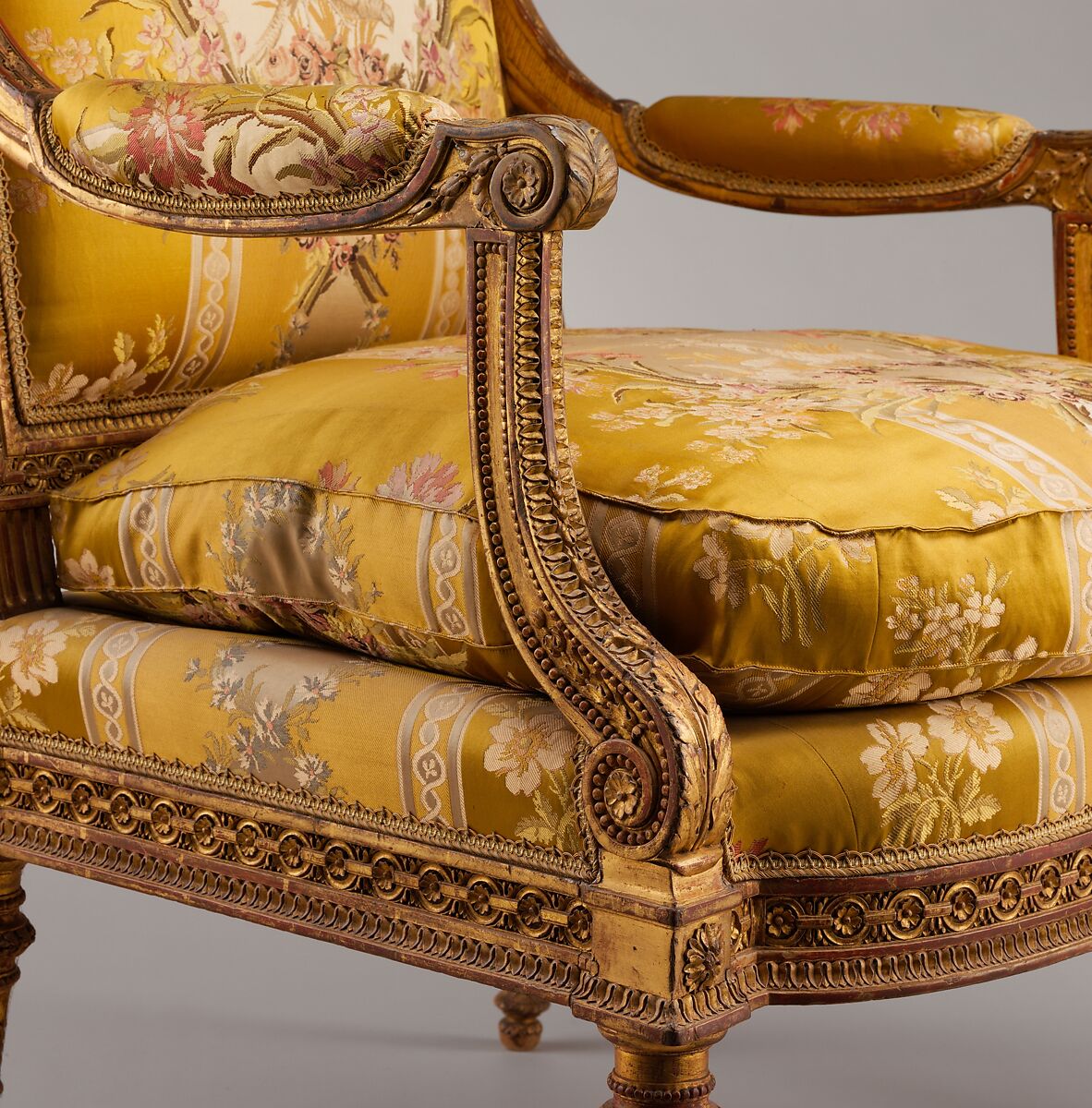 Armchair (fauteuil) from Louis XVI's Salon des Jeux at Saint Cloud, Georges Jacob (French, Cheny 1739–1814 Paris), Carved and gilded walnut; gold brocaded silk (not original), French, Paris