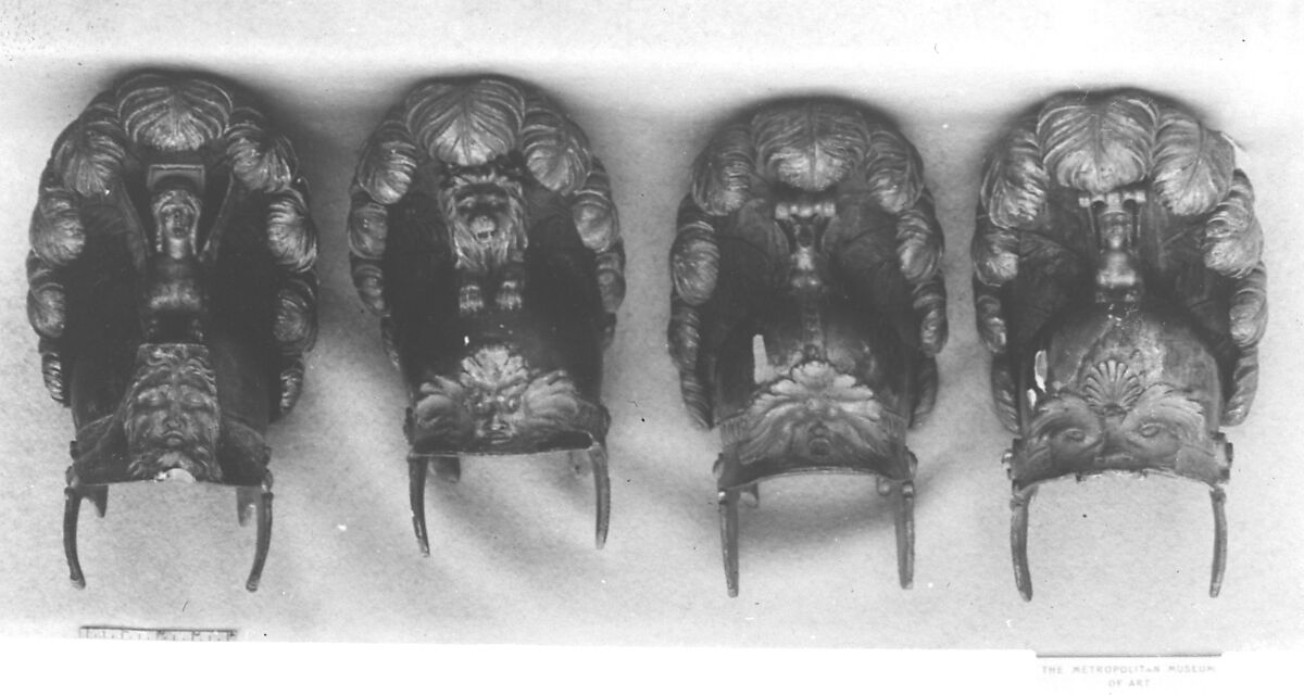 Set of four casques, Painted and gilded wood, French