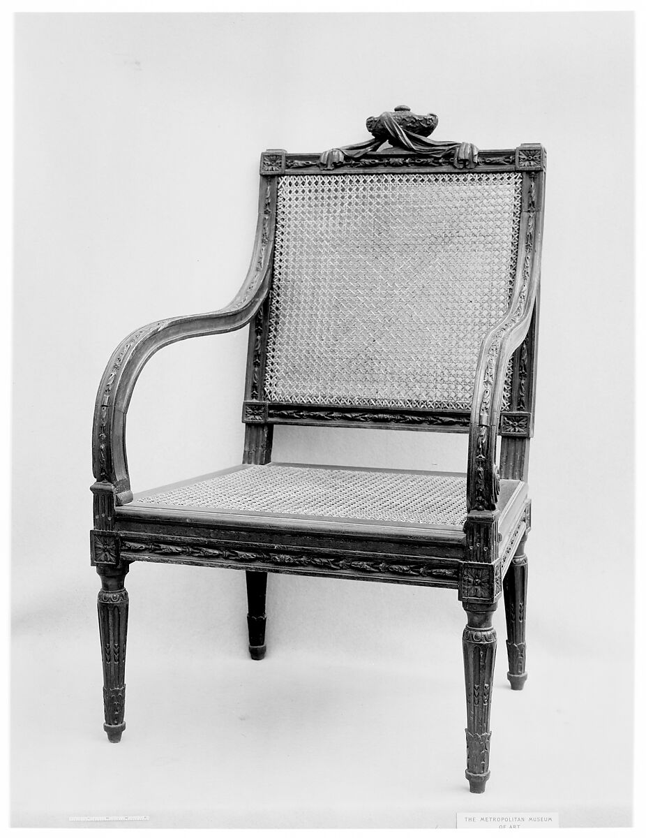 Armchair (fauteuil), Carved walnut, wax-polished; caning, French 