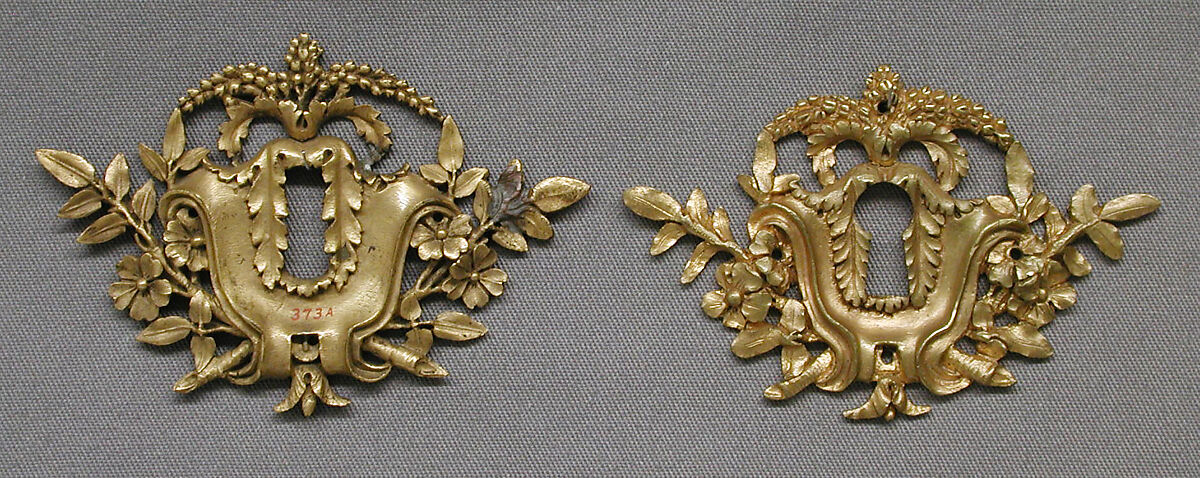 Pair of keyhole escutcheons, Gilt bronze, French