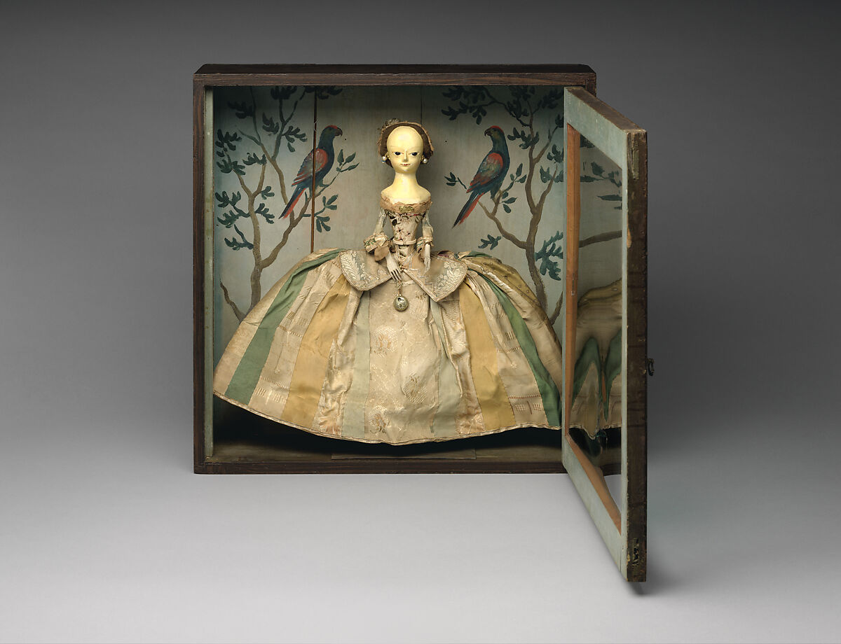 Doll in a box, Doll: Wood, paint, glass, silk, human hairBox: White pine, crown glass, paint, metal, British (Doll) and American (Box) 