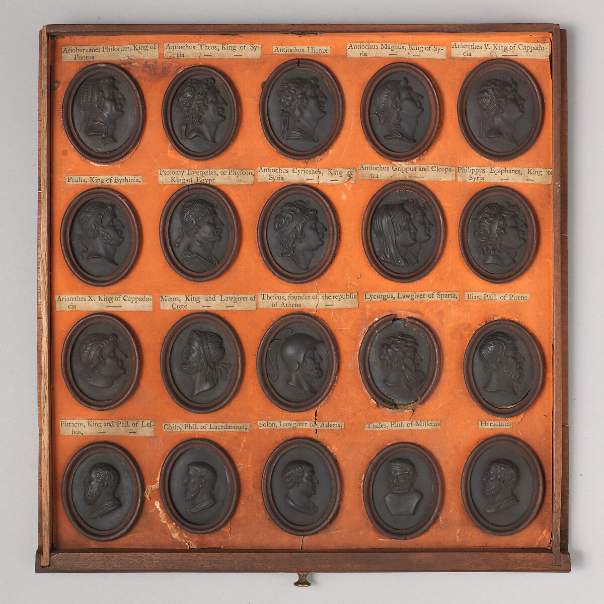 Cabinet of 140 plaques, Basalt ware, British, Staffordshire