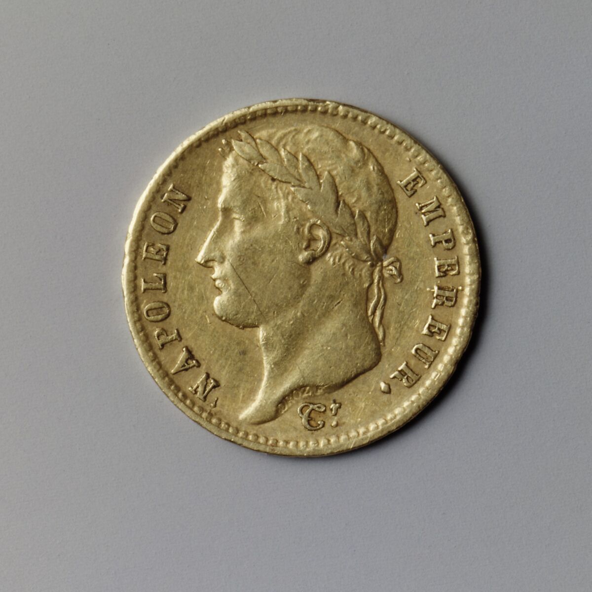 20-franc piece with Napoleon I's profile. 