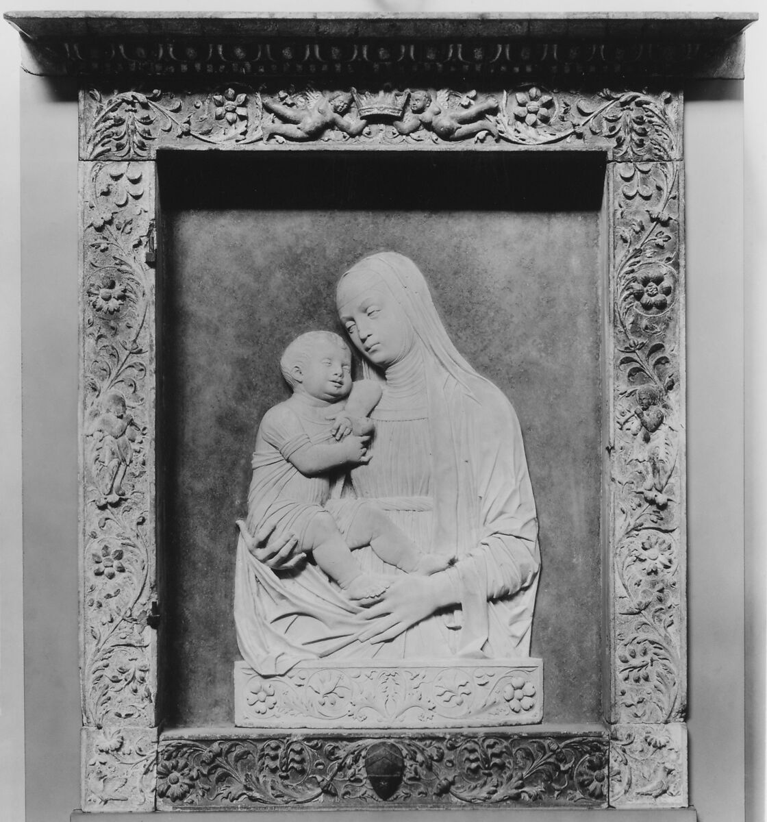 Madonna and Child, Pietro Lombardo (or Pietro di Martino da Carona) (Italian, Carona, Lombardy ca. 1435–1515 Venice), Relief: stone, traces of gilding; Frame: stone painted blue and gilded in parts, Italian, Venice