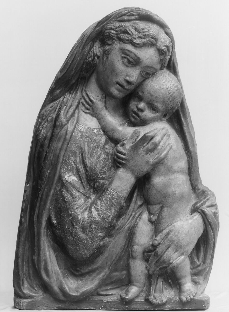 Madonna and Child, School of Donatello (Italian, Florence ca. 1386–1466 Florence), Figures: terracotta, polychromed and gilded; later background: wood, painted to represent brocade; frame: carved and painted, mouldings gilt, Italian