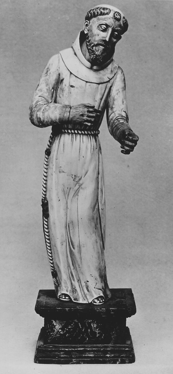 Saint Francis of Assisi, Figure: ivory, with hair, beard and cord painted brown; base: wood, probably Goan 