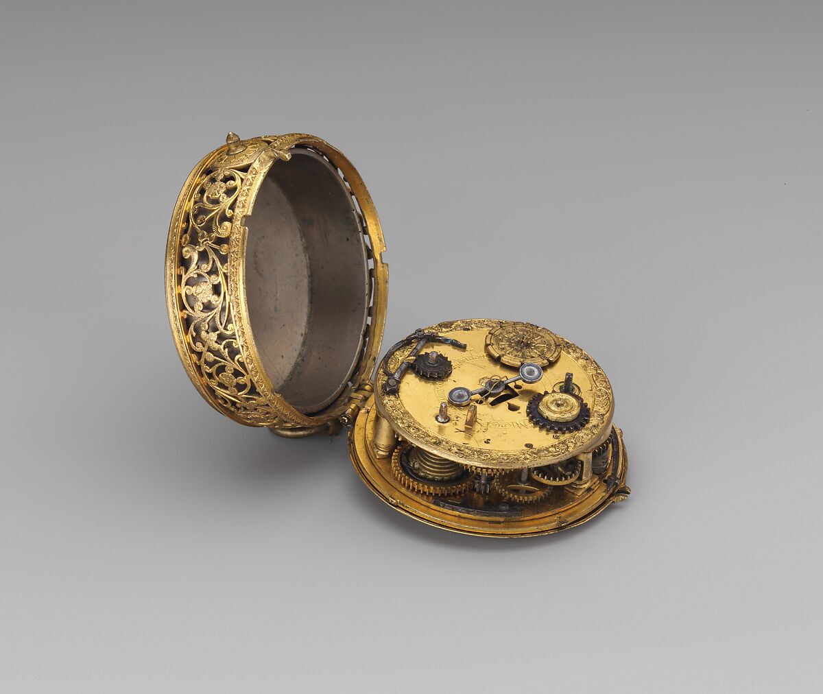 Clock watch, Movement by Michael Nouwen, or Nouen (Flemish, active London, ca. 1600–10, died 1613), Case: gilded brass; Dial: gilded brass with a blued steel hand; Movement: gilded brass and iron, British, London