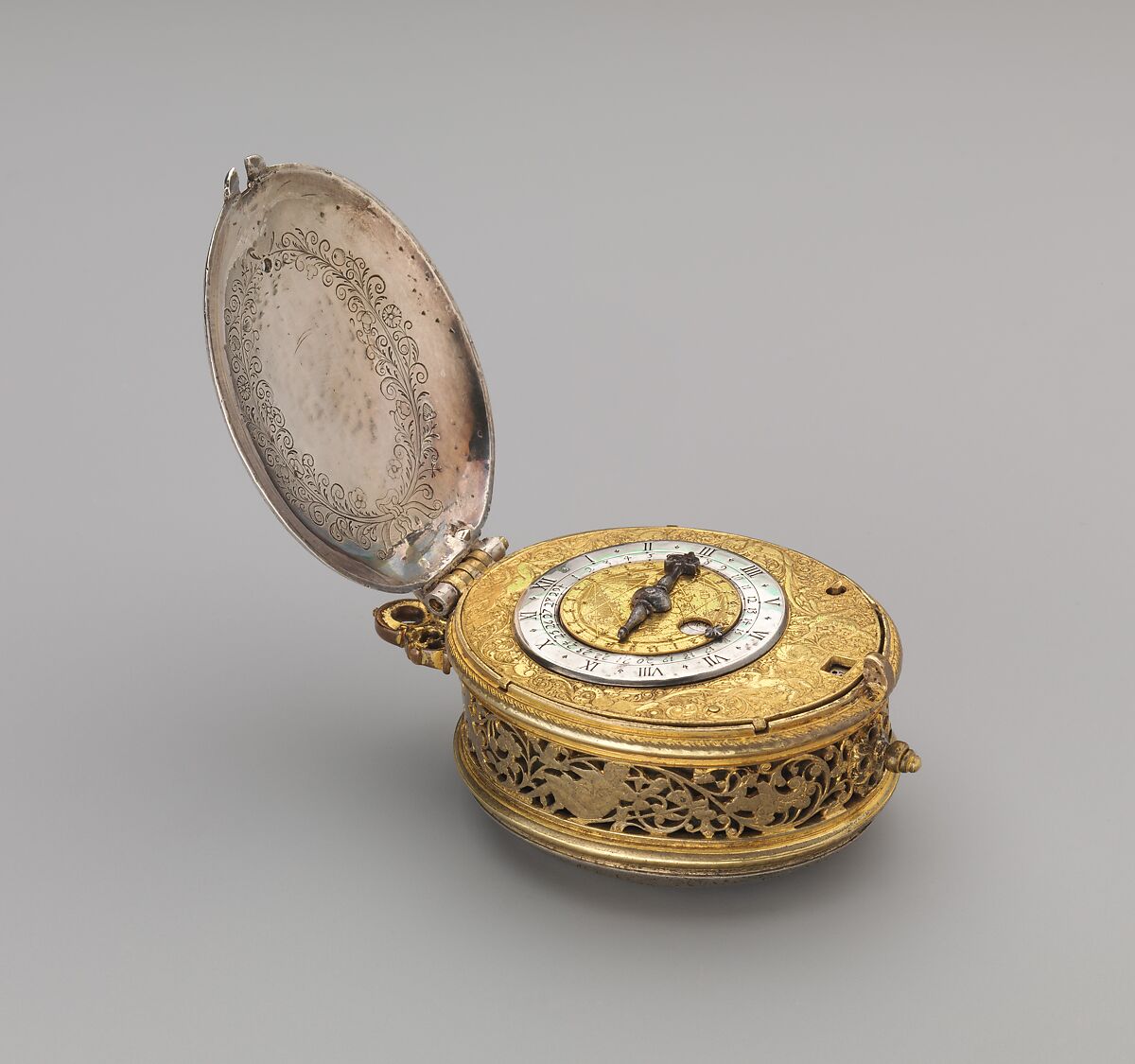 Clock-watch with alarm and calendar, Watchmaker: Nicolas Forfaict (French, Paris, ca. 1580–1615), Movement: gilded breass and steel, partly blued; case and dial: brass, silvered brass, silver; hand: steel, French, Paris 