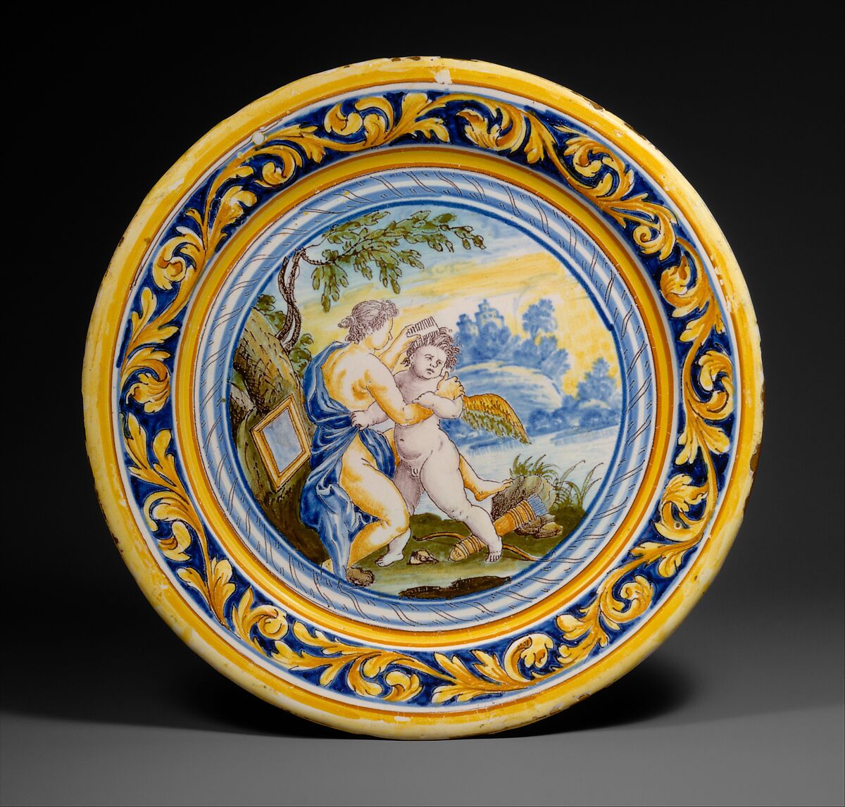Plate with Venus combing Cupid's hair, After an engraving by Odoardo Fialetti (Italian, Bologna 1573–1637/38 Venice), Faience (tin-glazed earthenware), French, Nevers 