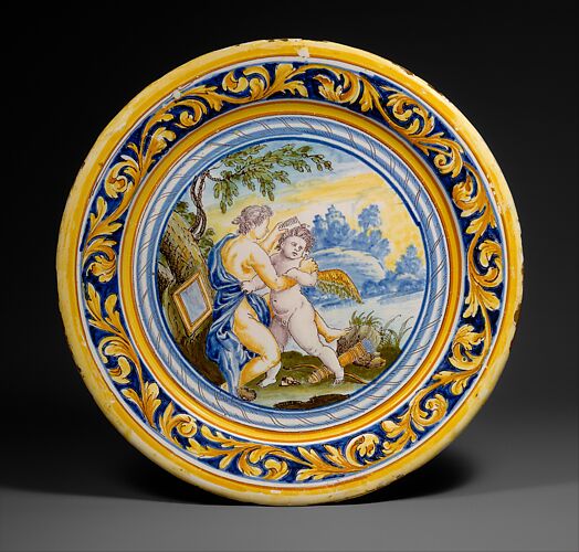 Plate with Venus combing Cupid's hair