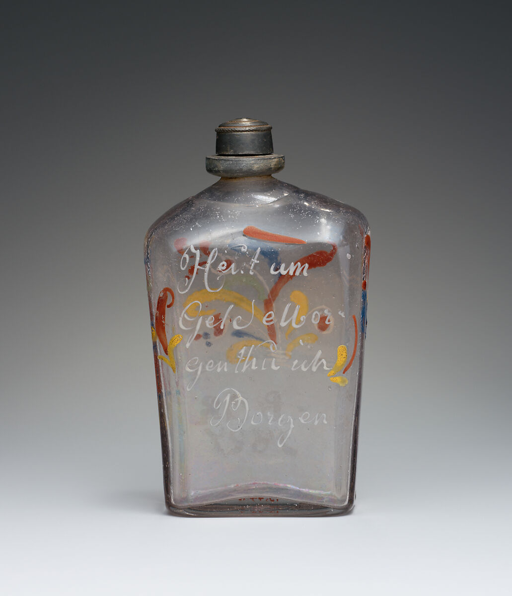 Bottle, Clear glass; metal screw top, German