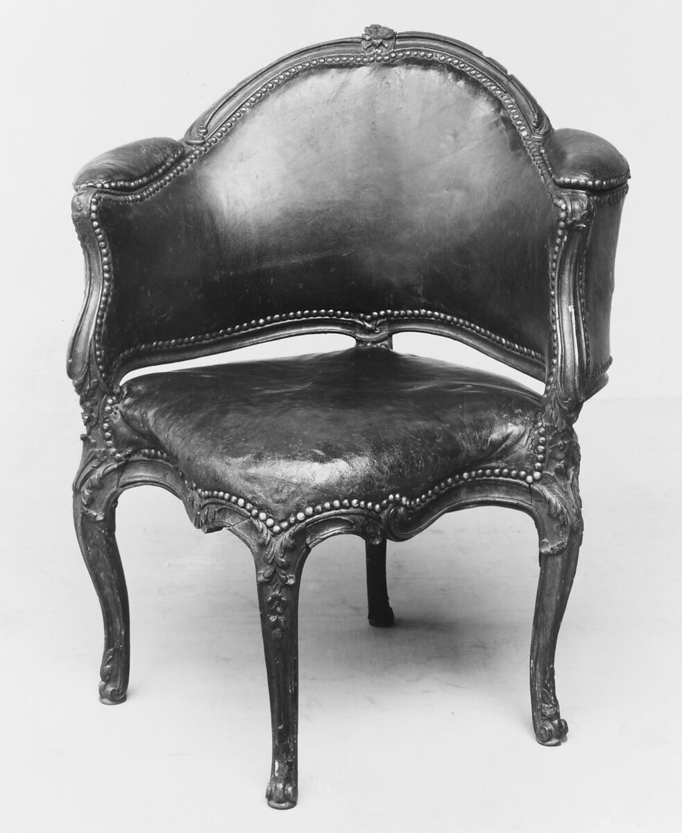 Desk chair (Fauteuil de bureau), Carved walnut; leather upholstery, brass nails, French