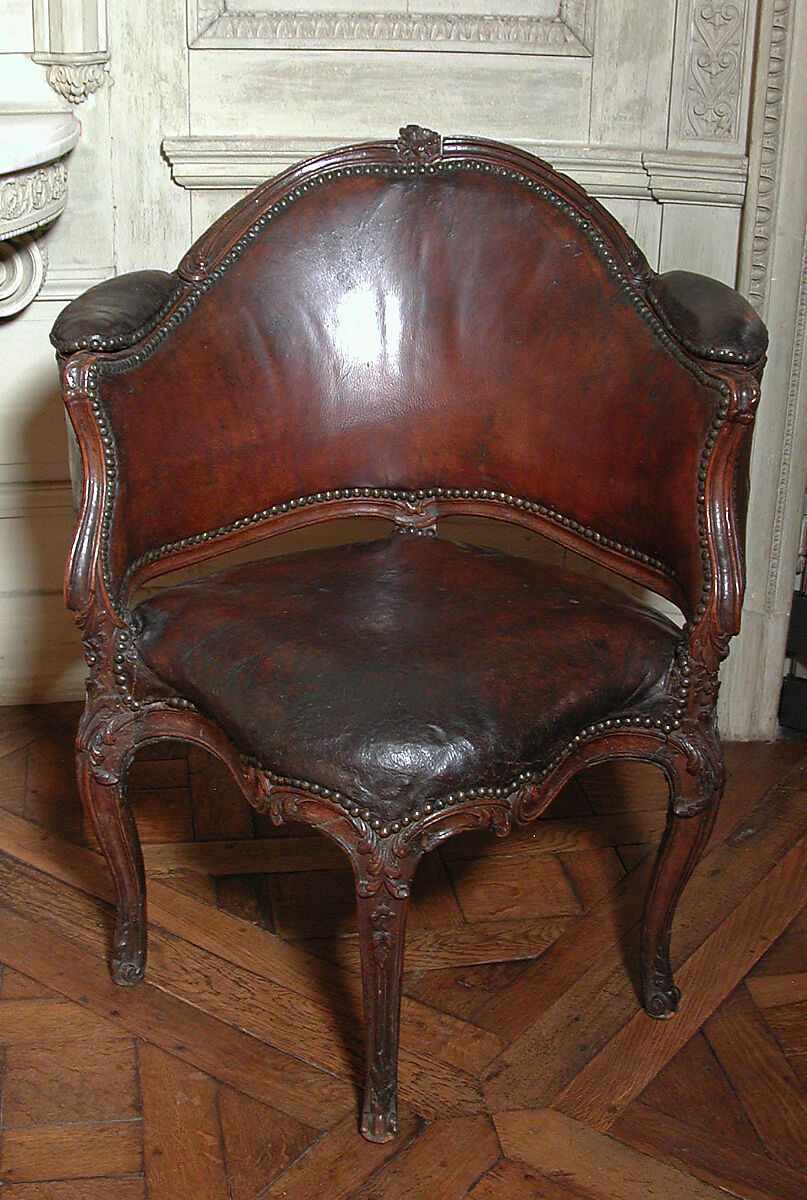 Desk chair (Fauteuil de bureau), Carved walnut; leather upholstery, brass nails, French 