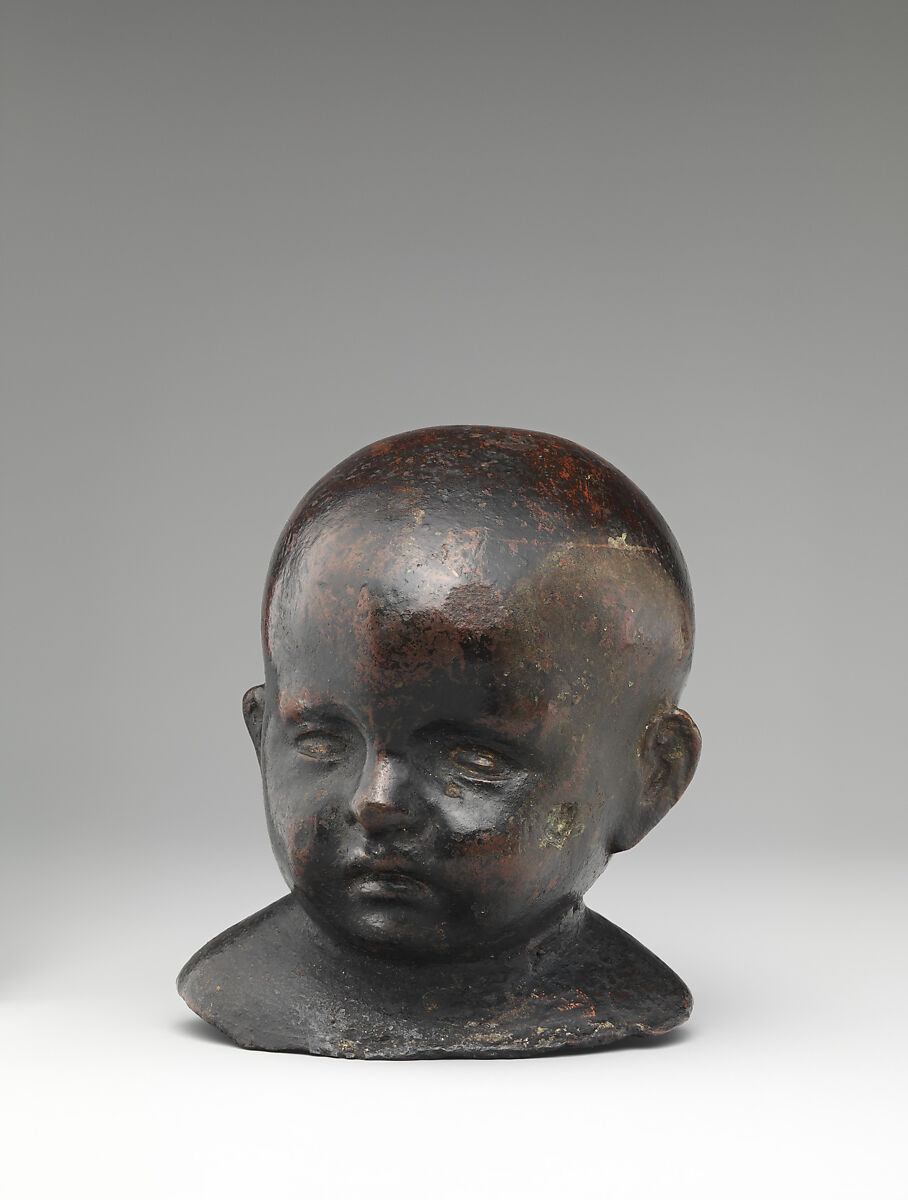 Head of an Infant, Bronze, eyes polished, on a later marble base, Northern Italian 