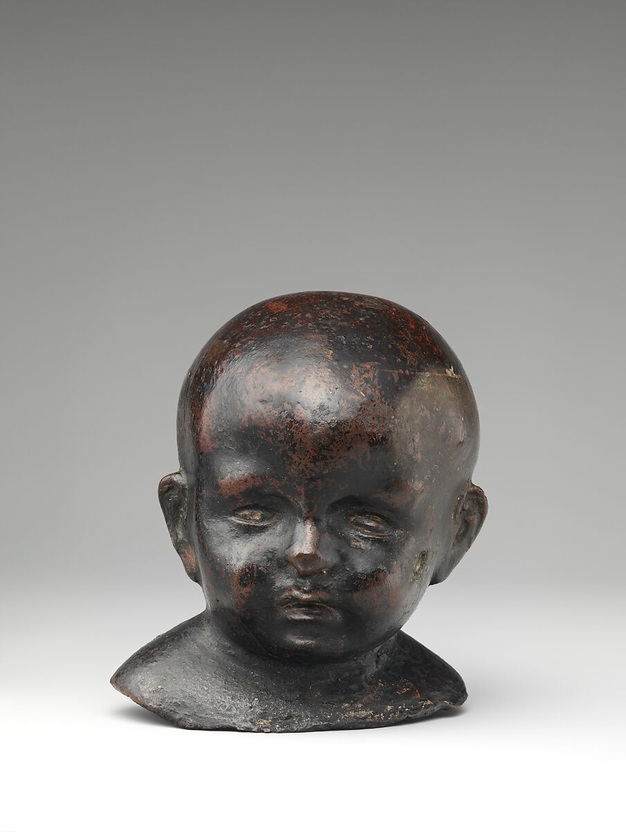Head of an Infant, Bronze, eyes polished, on a later marble base, Northern Italian