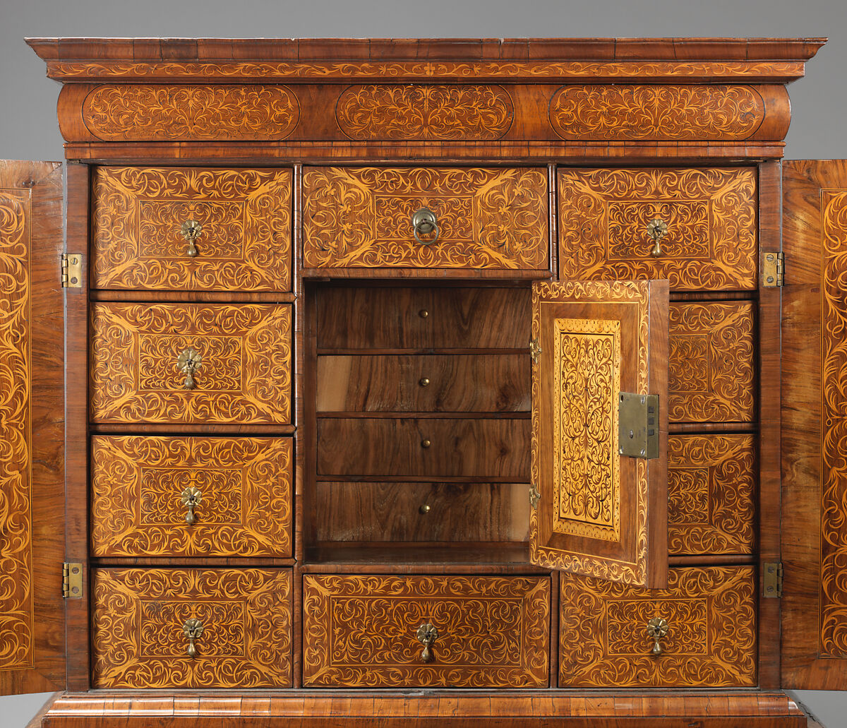 Cabinet on stand, Pine veneered with marquetry of walnut, burl; walnut and holly; oak drawers; brass hardware, British